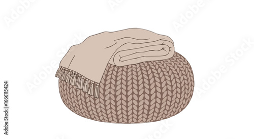 Knitted pouf with folded blanket in neutral color scheme  