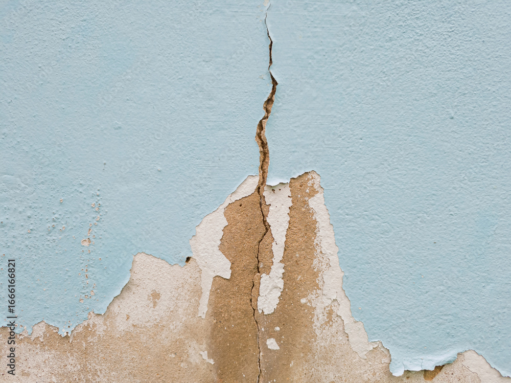 Εκτύπωση καμβά Close-up light blue painted wall with large, peeling sections revealing gray, rough concrete underneath