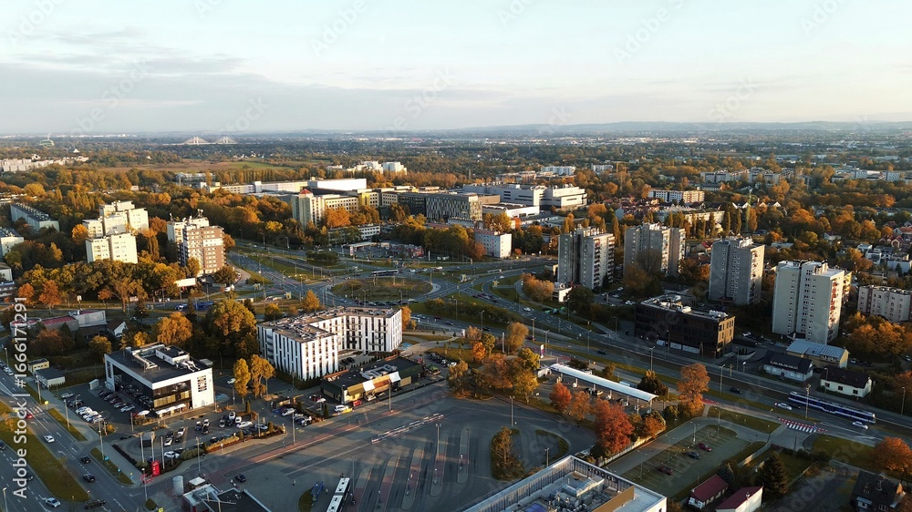 Fototapeta premium Modern high-rises and parking lots at sunset