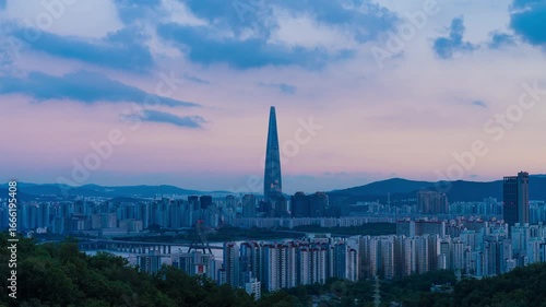 Zoom in 4k Cityscape night view of Seoul, South Korea at sunset time