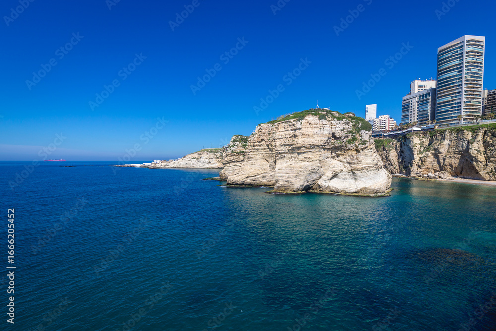 Fototapeta premium Raouche Rocks also called Pigeon Rock in Beirut, capital city of Lebanon