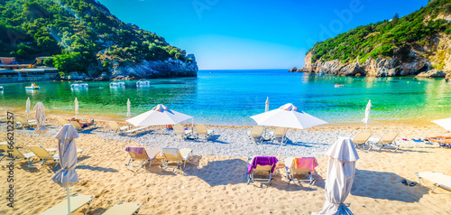 Fototapeta Naklejka Na Ścianę i Meble -  popular beaches of Corfu, panorama of Paleokastritsa beach and Ionian sea on Korfu, Greece