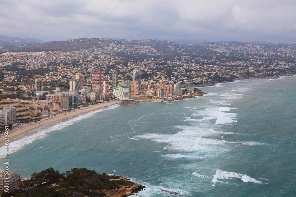 Fototapeta premium Calpe town in Costa Blanca, Spain. Spectacular view with Fossa beach (Platja de la Fossa).