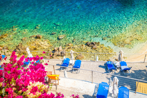 Fototapeta Naklejka Na Ścianę i Meble -  Paleokastritsa beach, small bay and Ionian sea clear water on Korfu, Greece