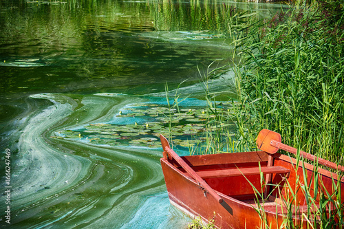 The polluted lake showcases the devastating effects of wastewater and ecological disaster.