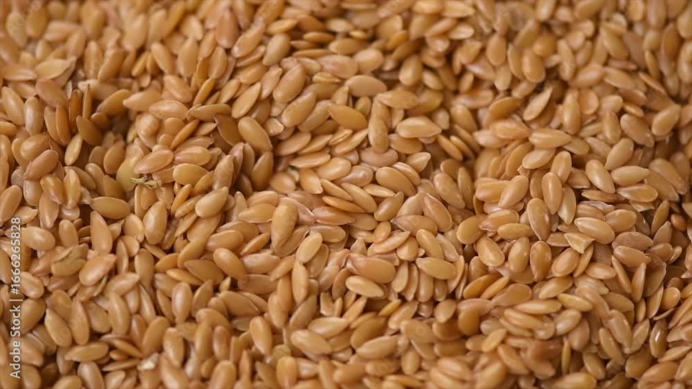 Flax seeds, Linen seeds, Linseed. Flaxseed Background, closeup. Linen seed. Healthy vegan food backdrop rotating, diet. Top view, flat lay, slow motion Flax seeds, Linen seeds, Linseed. Flaxseed Background, closeup. Linen seed. Healthy vegan food backdrop rotating, diet. Top view, flat lay, slow motion