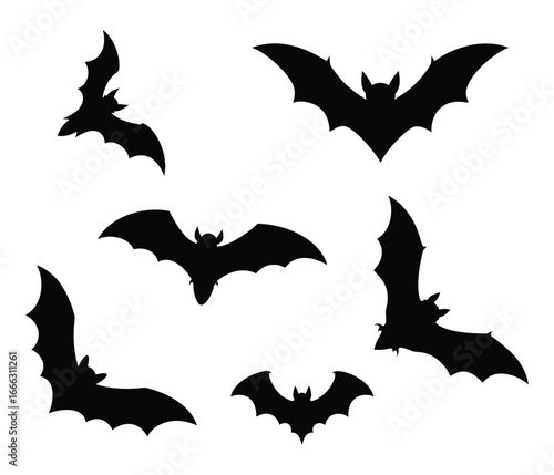 A collection of six black bat silhouettes in various flying poses against a clean white background for halloween