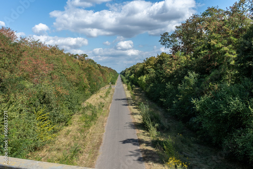 Wallpaper Mural Langer Radweg auf ehemaliger Bahnstrecke am Hambacher Tagebau Torontodigital.ca