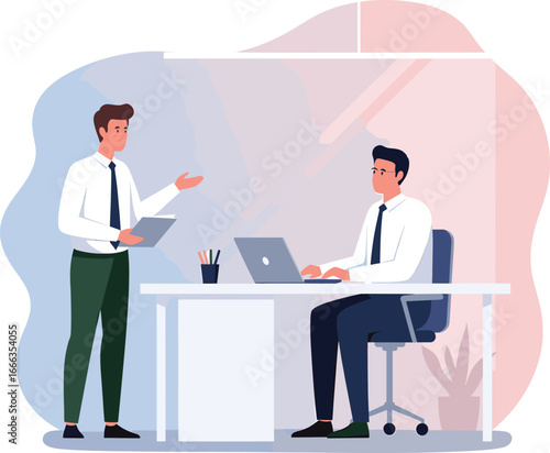 Two professional businessmen collaborating in a modern office one standing and presenting while the other works on a laptop at his desk.