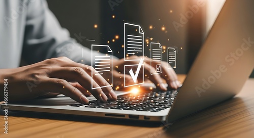 Closeup of hands typing on a laptop with digital document icons, representing data management, compliance, and regulatory standards