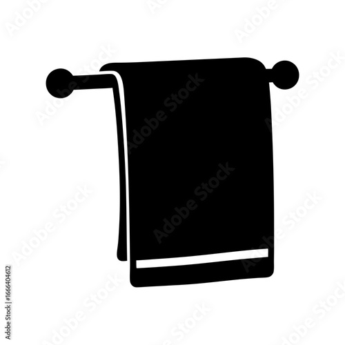 Black towel hangs on a towel rack with two spherical ends