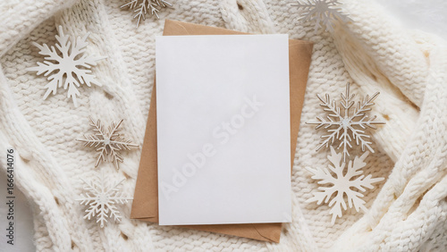 Cozy winter scene with blank card and envelope, perfect for holiday greetings, invitations, and seasonal designs