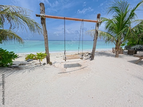 Fototapeta Naklejka Na Ścianę i Meble -  Tropical beach landscape with blue ocean water and sky