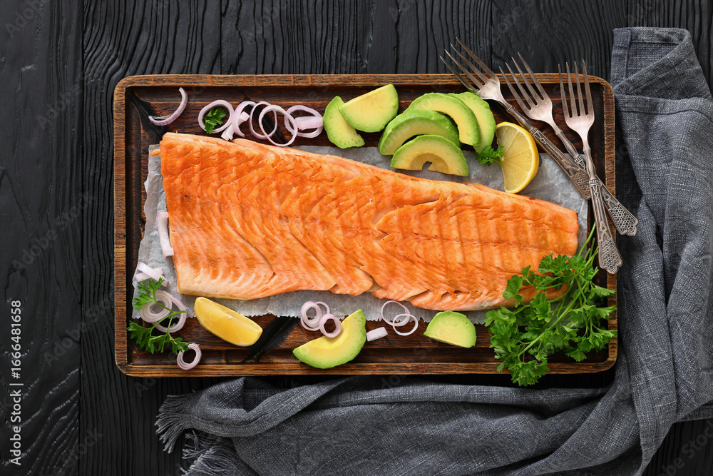 Ταπετσαρία grilled whole salmon fillet on wooden board
