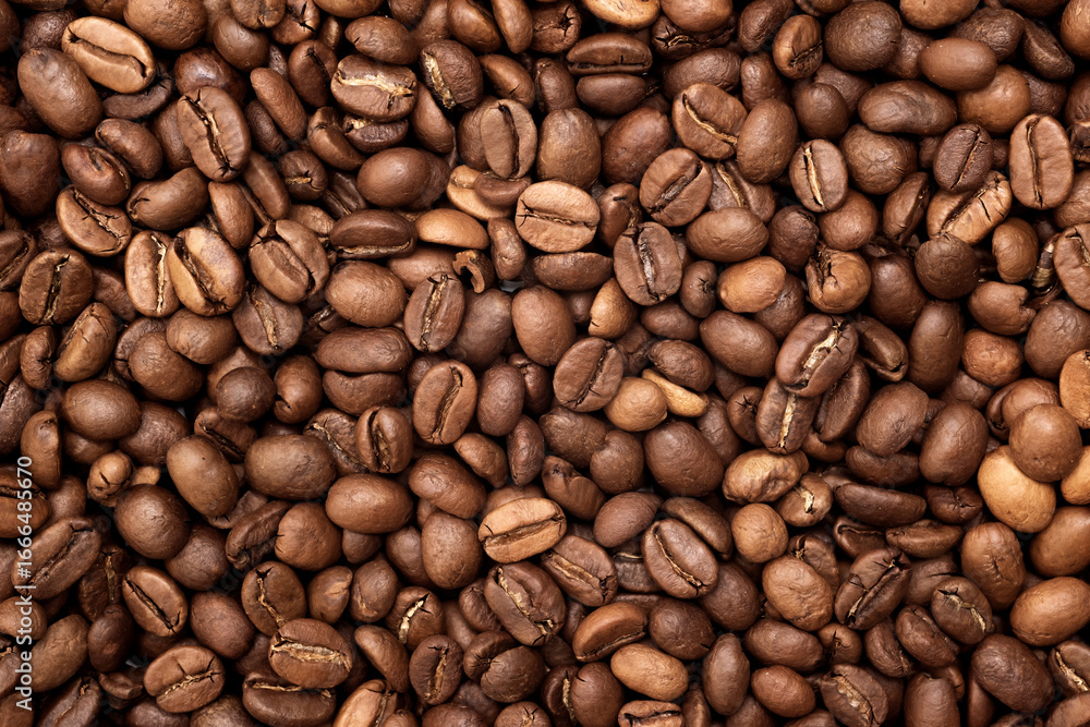 Fototapeta premium Coffee bean background in detail. Roasted coffee beans food concept