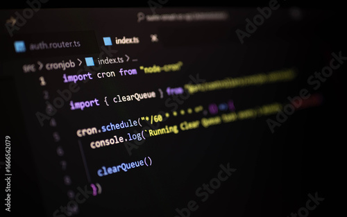 Konstfotografi Close-up of JavaScript code using node-cron to schedule automated background tasks
