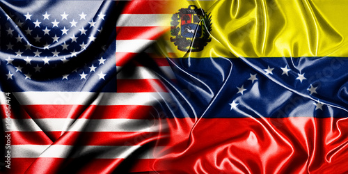 The national flags of the United States and Venezuela merge into one and are placed side by side on a fluttering cotton background. Flags.