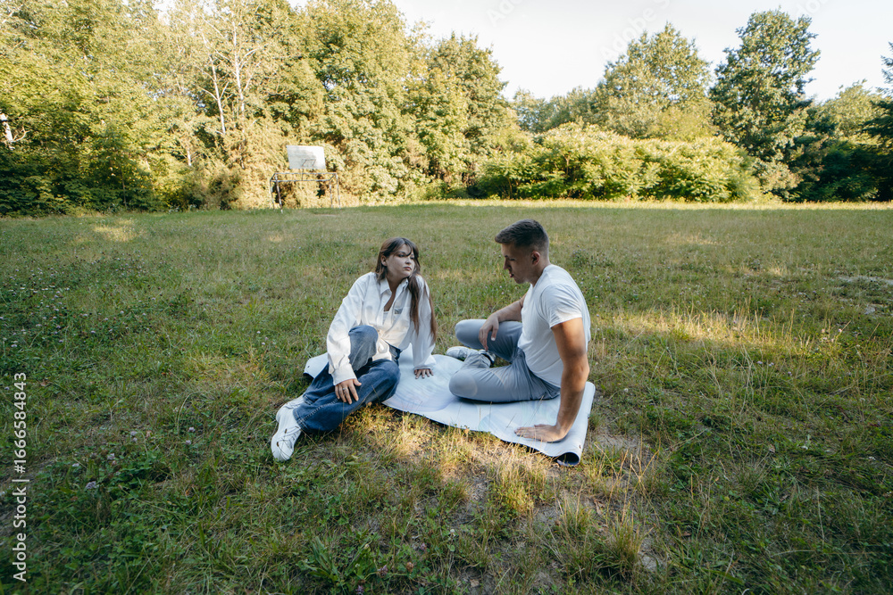 Young couple relax at nature at summer Young couple relax at nature at summer