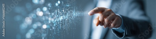 Businessman touching a digital interface with glowing particles representing future technology and innovation in business strategy
