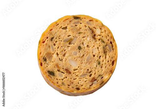 Close-up view of a circular slice of savory, spiced sausage, showcasing its textured interior.