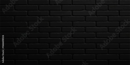 A weathered black and dark brown brick wall with a distinct texture and aged pattern