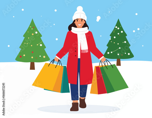 A woman happily walks in the snow, carrying shopping bags near decorated Christmas trees.
