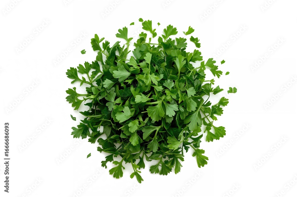 Obraz premium Top view of a heap of chopped dried parsley leaves on a white surface