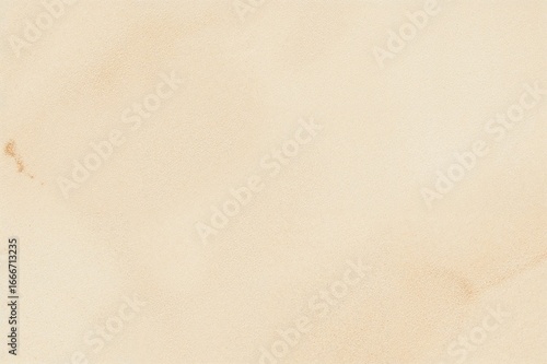 A cream-colored paper backd...