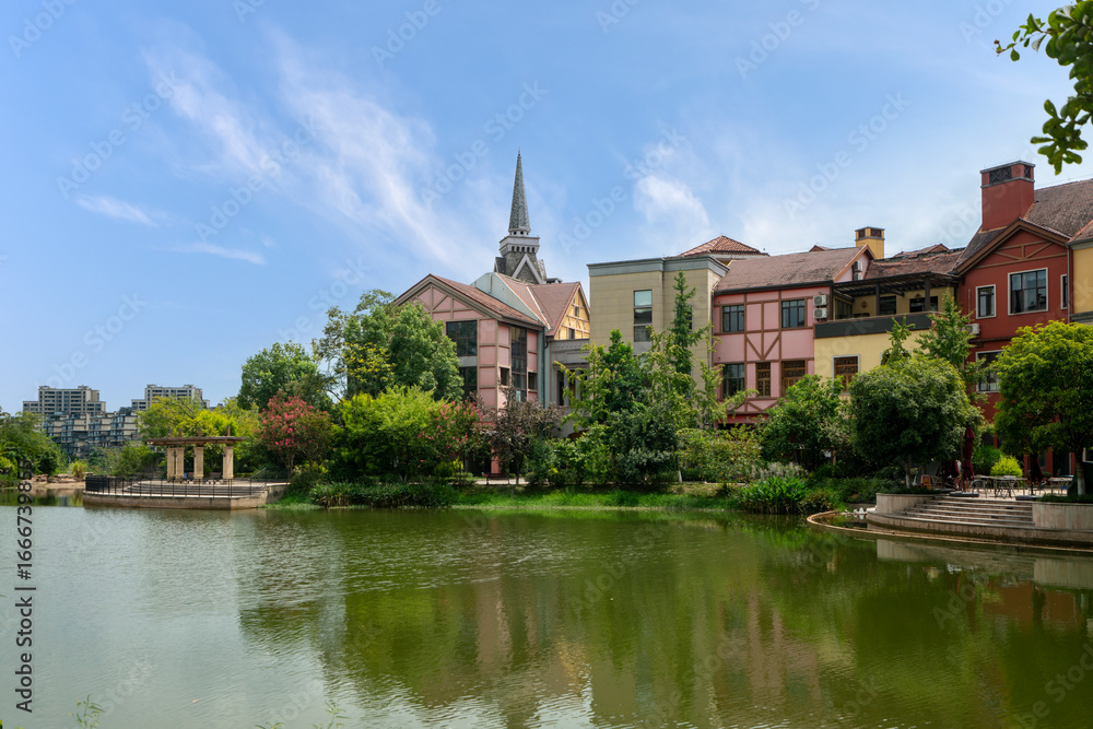 Fototapeta premium The European town by the lake
