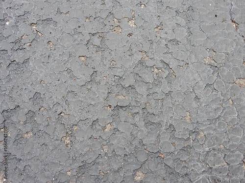 Fotografija asphalt pavement cracked surface rough texture