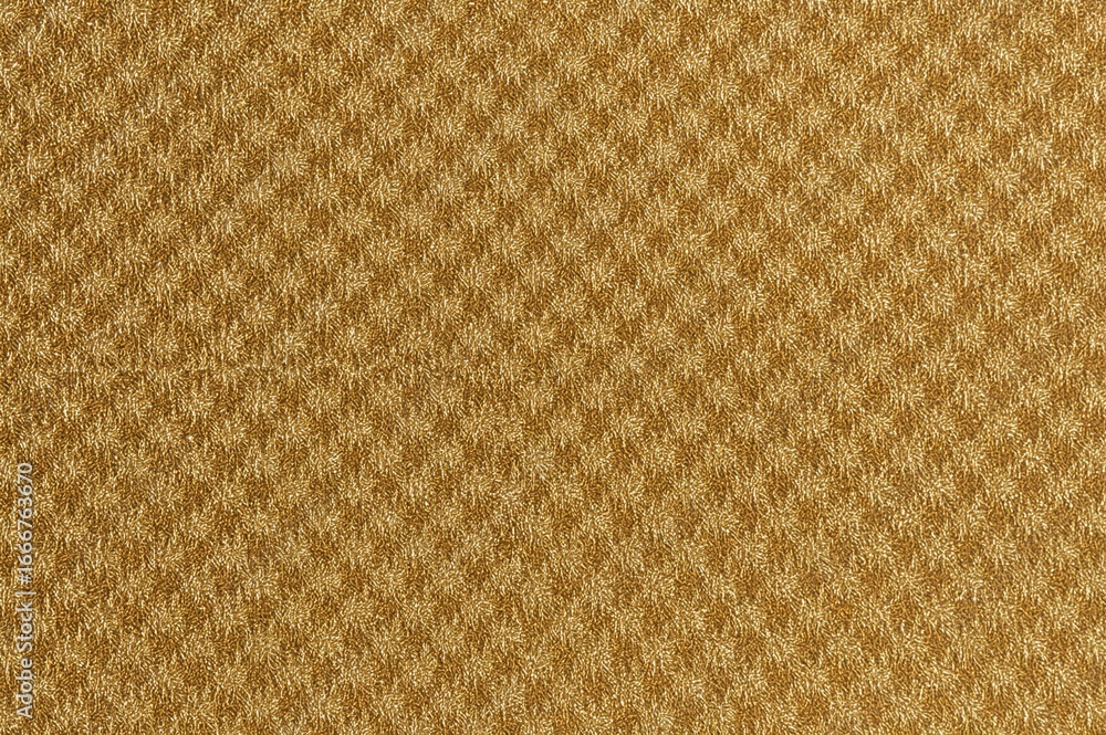 Fototapeta premium Detailed View of Metallic Gold Mesh Textile with Abstract Pattern and Seamless Design