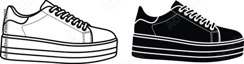 Two platform sneakers one white and one black on a white background