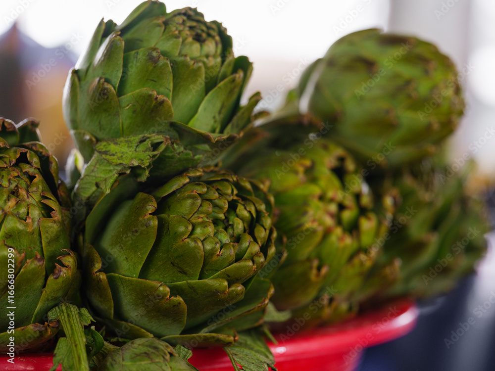 Fototapeta premium fresh artichokes at organic market