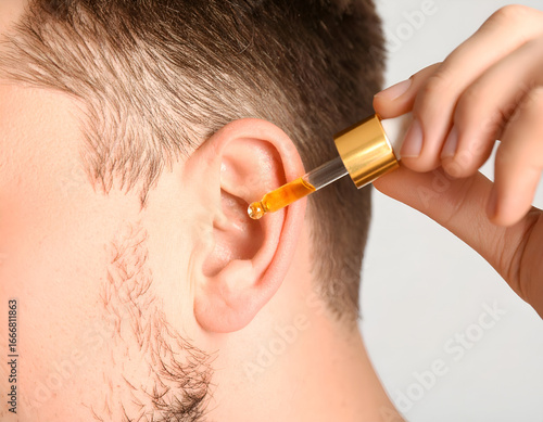 Ear Care Solution: Applying Ear Drops for Health and Hygiene