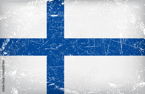 Vintage grunge textured Finland national flag with distressed surface effect and rough worn blue Nordic cross on white background.