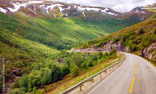 High-quality roads with fog markings among the high Scandinavian mountains and the plains of Norway. The weather in this region can change every hour.