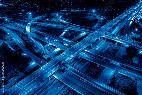 Expressway, Self-driving autonomous electric cars of the future with elements move along a busy traffic intersection. Artificial Intelligence, Car Scan, GPS Tracking, Smart Roads, IoT, highway