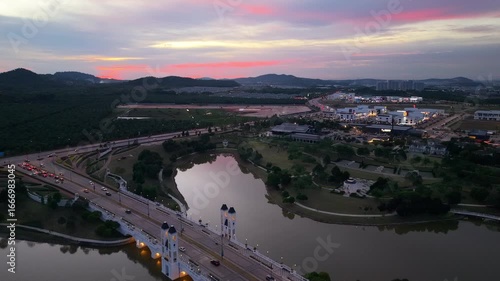 Blue Hour Aerial Pull Back Over Eco Grandeur Township and Lake Lights
