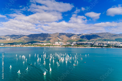 Gelendzhik resort. Sailing regatta in Gelendzhik Bay. lots of sailboats. The Caucasus Mountains are in the background. 