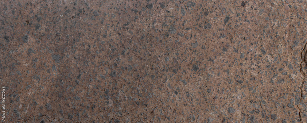 Fototapeta premium Close-up of brown stone surface with natural texture