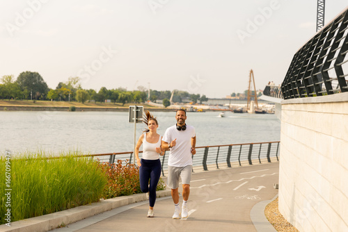 Couple enjoying a sunny jog...