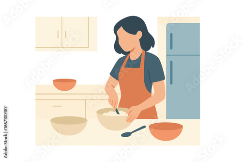 A woman prepares a meal in her kitchen, cutting a salad and cooking spaghetti, while under self-imposed quarantine at home to prevent the spread of covid-19 during the coronavirus outbreak