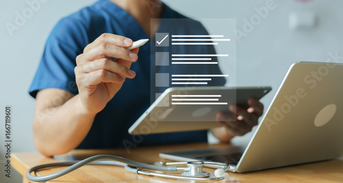 close up young general practitioner hand use stylus pen to check box on medical chekclist or opd record to read and diagnose and assess about patient's symptom for healthy and lifestyle concept