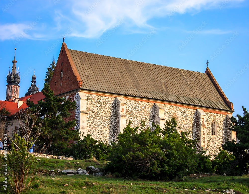 Fototapeta premium Ancient church atop a hill
