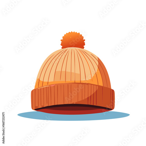 Orange knitted beanie hat with a fluffy pompom an essential warm winter clothing accessory