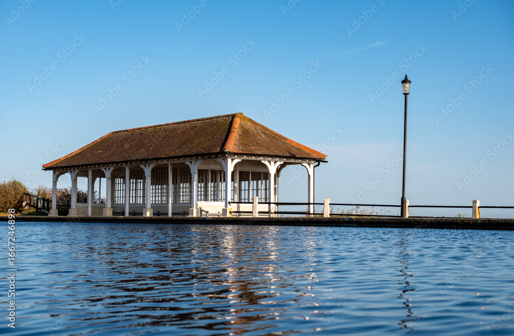 Boating lake and wooden shelter on the cliff top in the Norfolk town of Sheringham Boating lake and wooden shelter on the cliff top in the Norfolk town of Sheringham