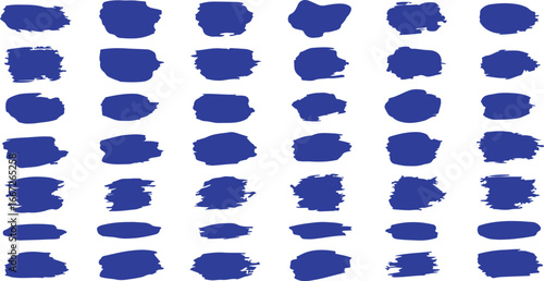 Collection of royal blue ink brush strokes splatter and smears artistic design elements