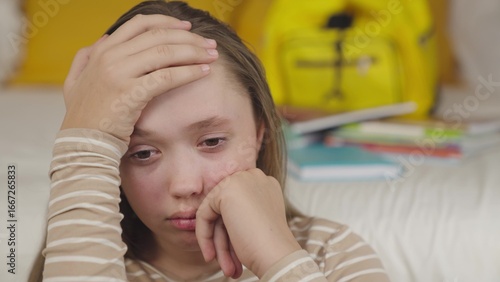 teenager girl is going through adolescence problems, school failure, conflict with classmates, parents, thinking about bad, irritation at education, nervous irritation rejected kid, lonely pain soul.