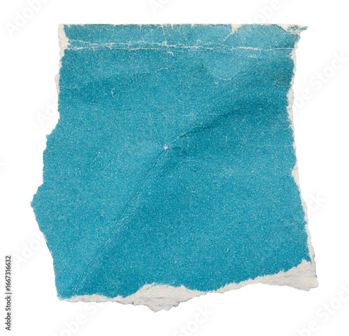 Torn piece of blue vintage book page, old crumpled paper isolated for scrapbooking