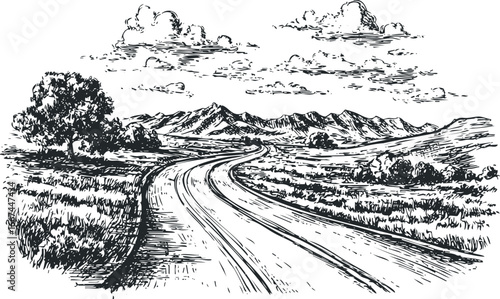 Winding road through grassy hills towards distant mountains under cloudy sky